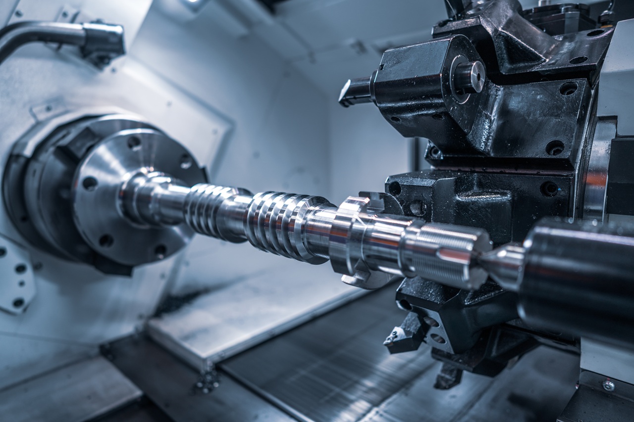 Metalworking CNC milling machine. Cutting metal modern processing technology. Small depth of field. Warning - authentic shooting in challenging conditions. A little bit grain and maybe blurred.
